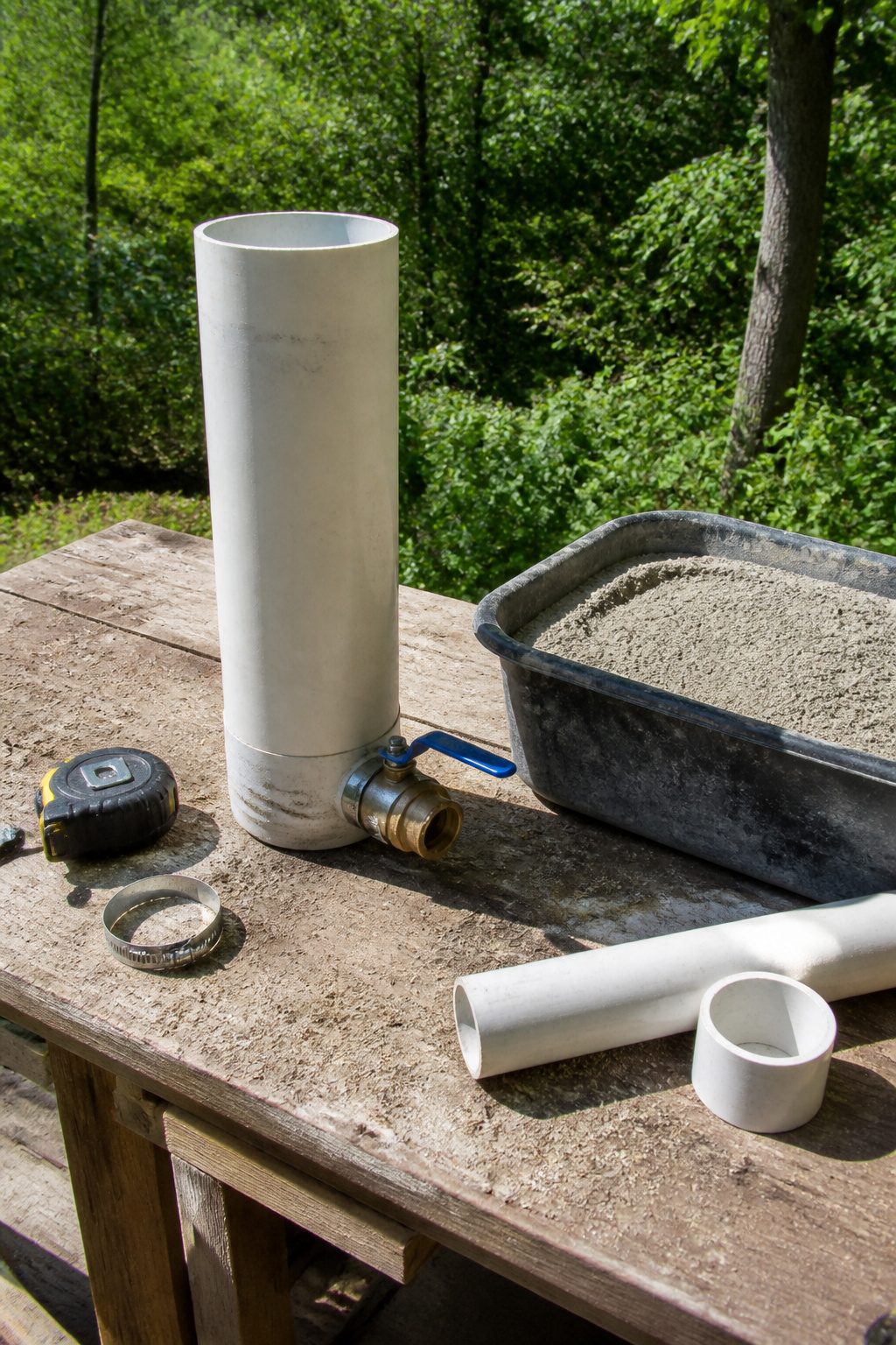 PVC pipe with ball valve and concrete mix for bailer.