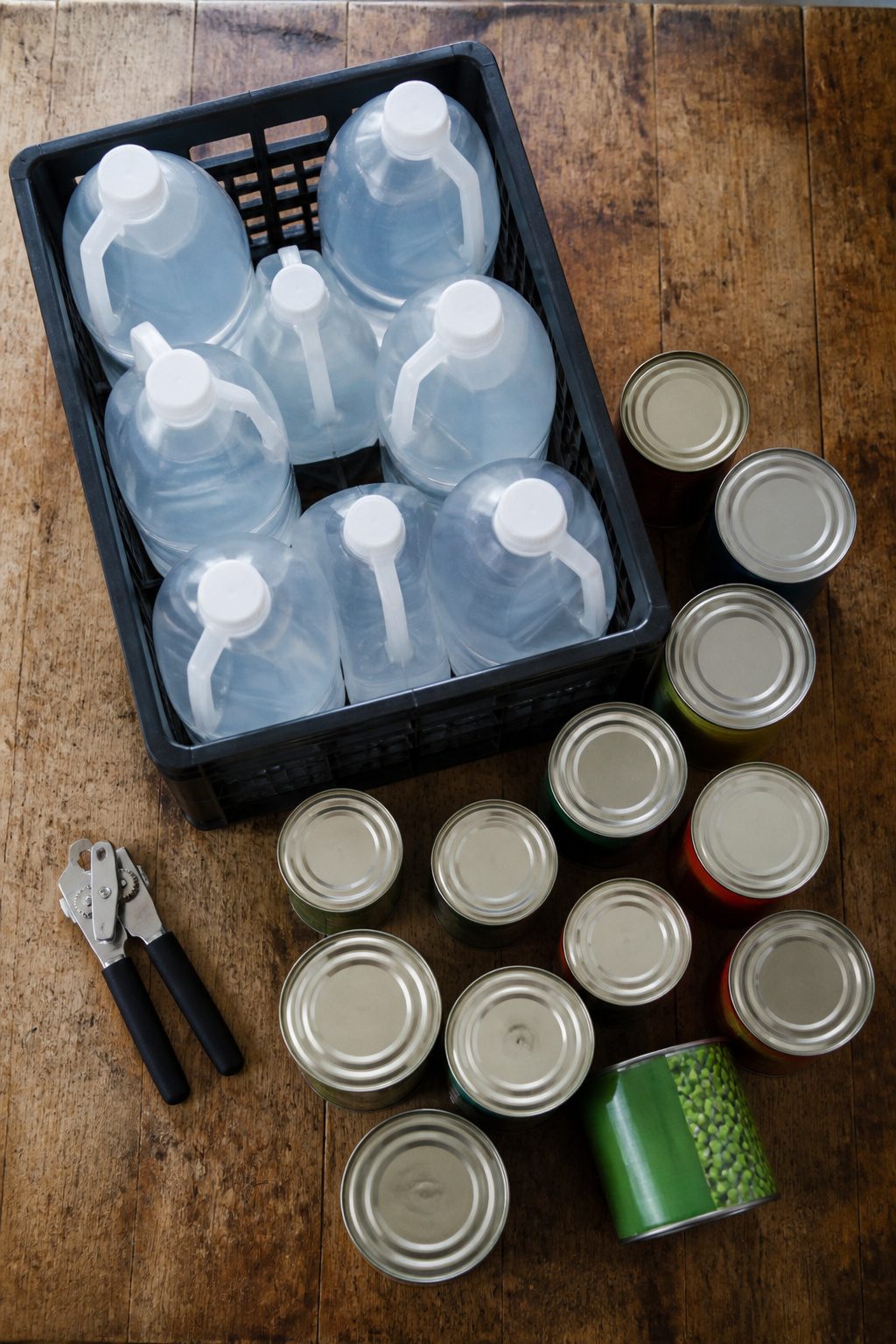 Emergency Preparedness Kits: What to Include in Yours 1 A photograph showing a gallon of water and non-perishable food items.