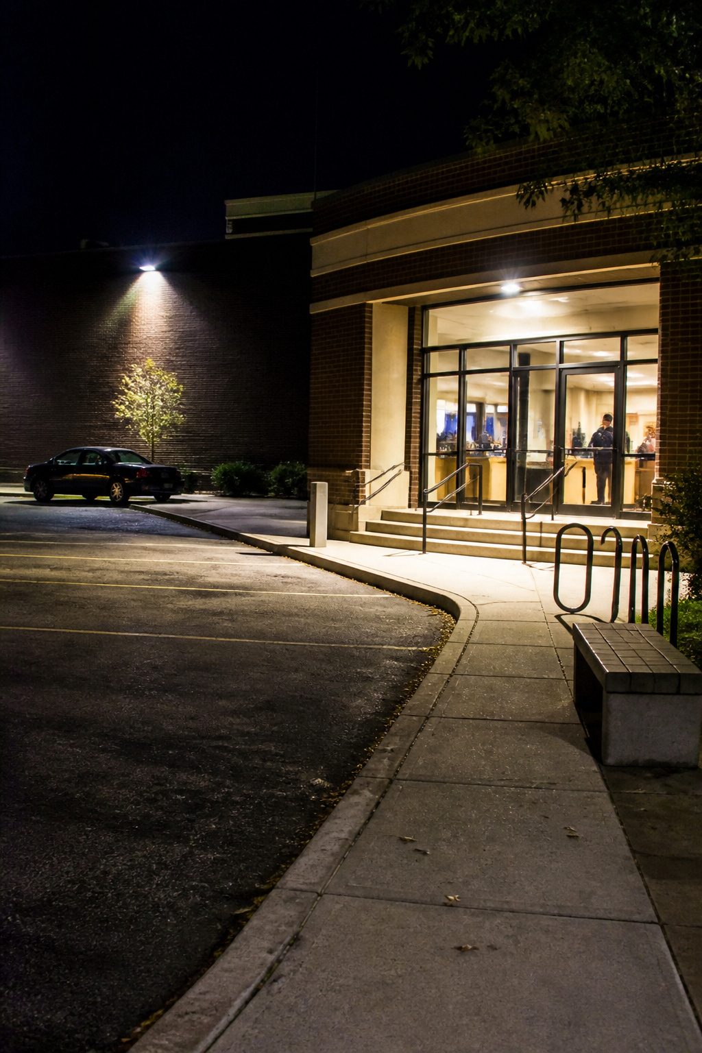 How to Know If Someone Is Following You in 2026 4 A police station with a visible entrance and parking lot.